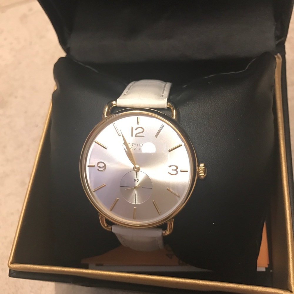 White watch with leather band
