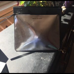 Sleek metallic Armani Exchange clutch!! 