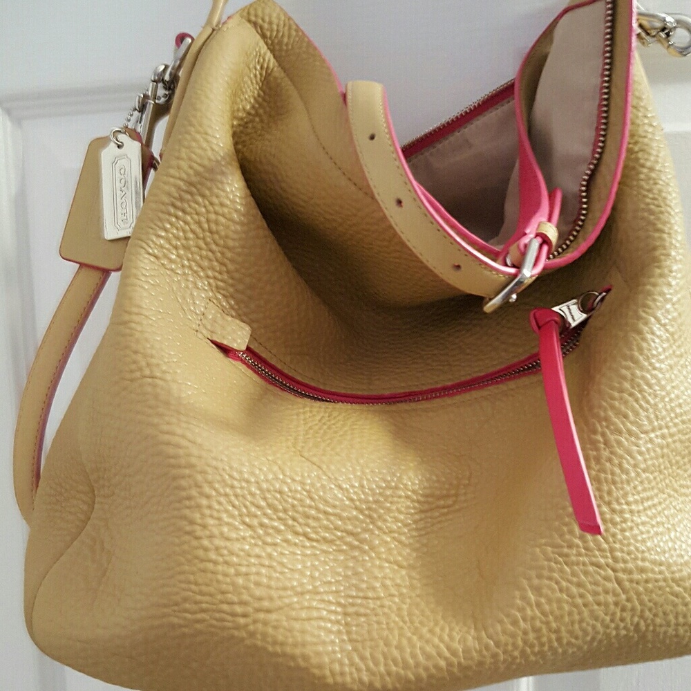 Coach purse tan with pink trim