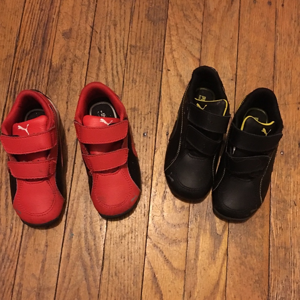 Red and black Ferrari Pumas | Black and yellow