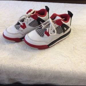 Fire red Jordan 4s