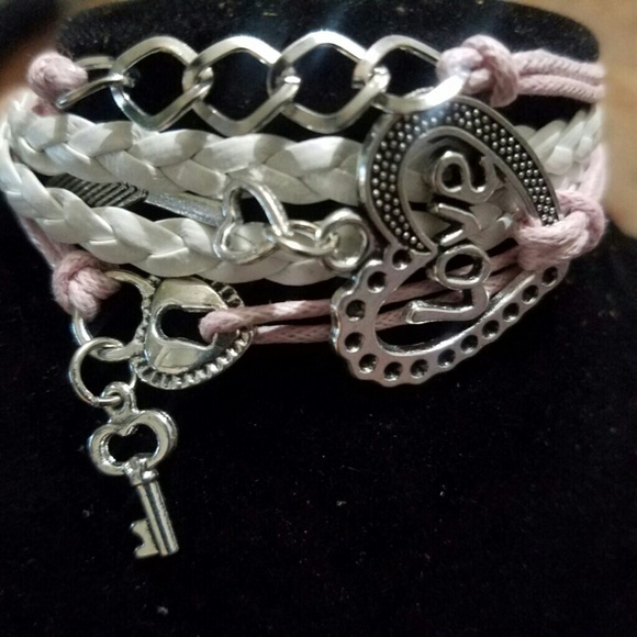 NEW INFINITY LEATHER BRACELET - Picture 1 of 1