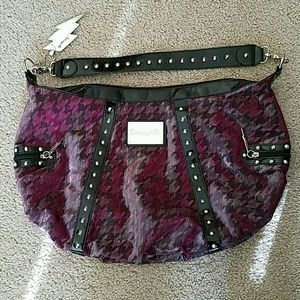 Betseyville Saber tooth purple and silver purse