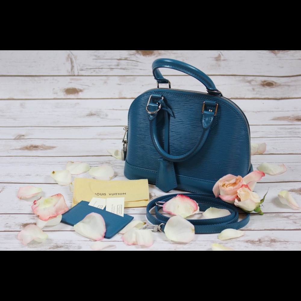 Louis Vuitton EPI Alma BB handbag. SN#FL0153