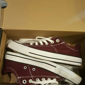 ** Hold **NEW Converse shoes