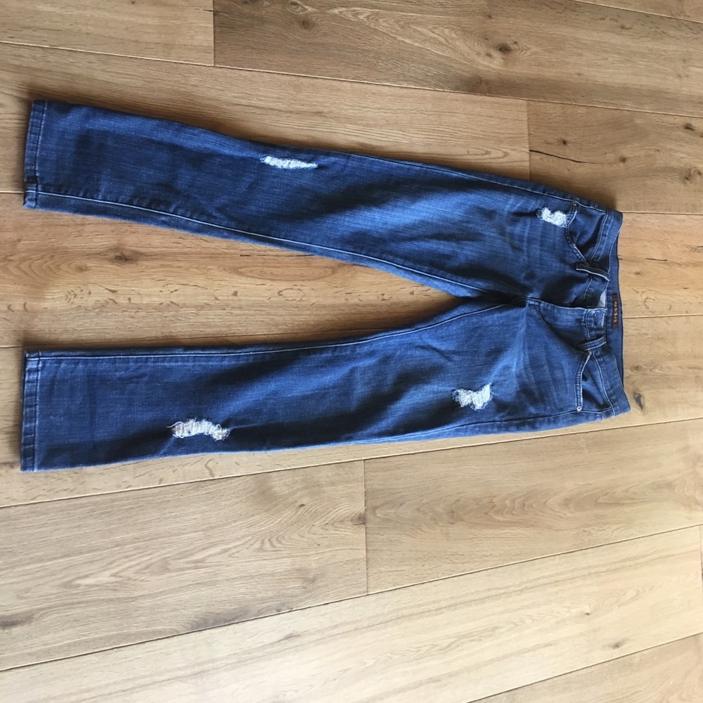 mid-waisted skinny, ripped James Jeans.