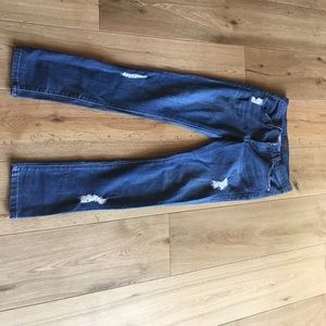 mid-waisted skinny, ripped James Jeans.