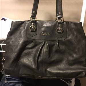 2 year old black coach bag.- lightly used