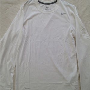 White long sleeve Nike dri fit shirt.