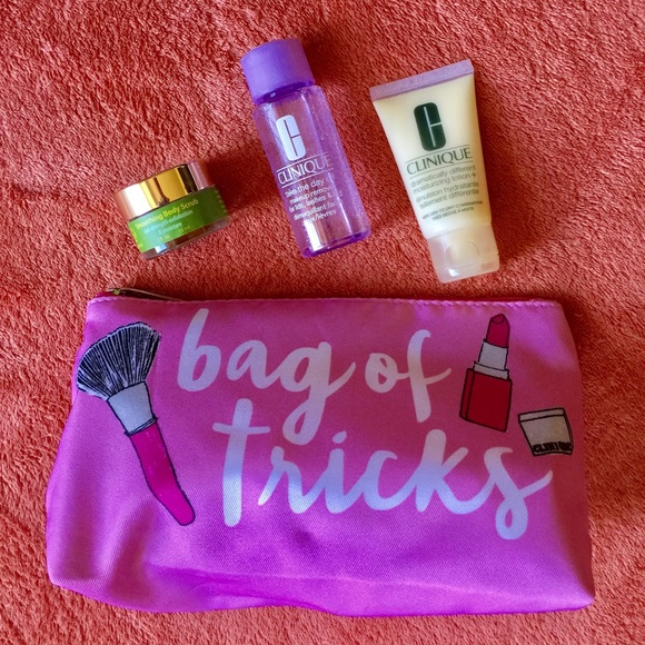 3/15$ CLINIQUE cosmetic bag with products. - Picture 1 of 4