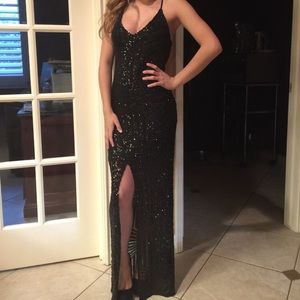 Black sequin dress from ANGL with leg slit