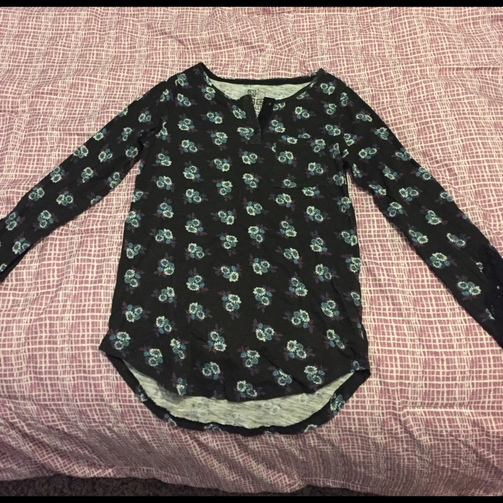 Long sleeved with lace arms.