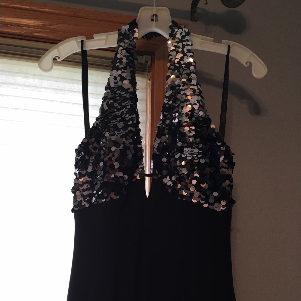 Black halter dress with sequined top