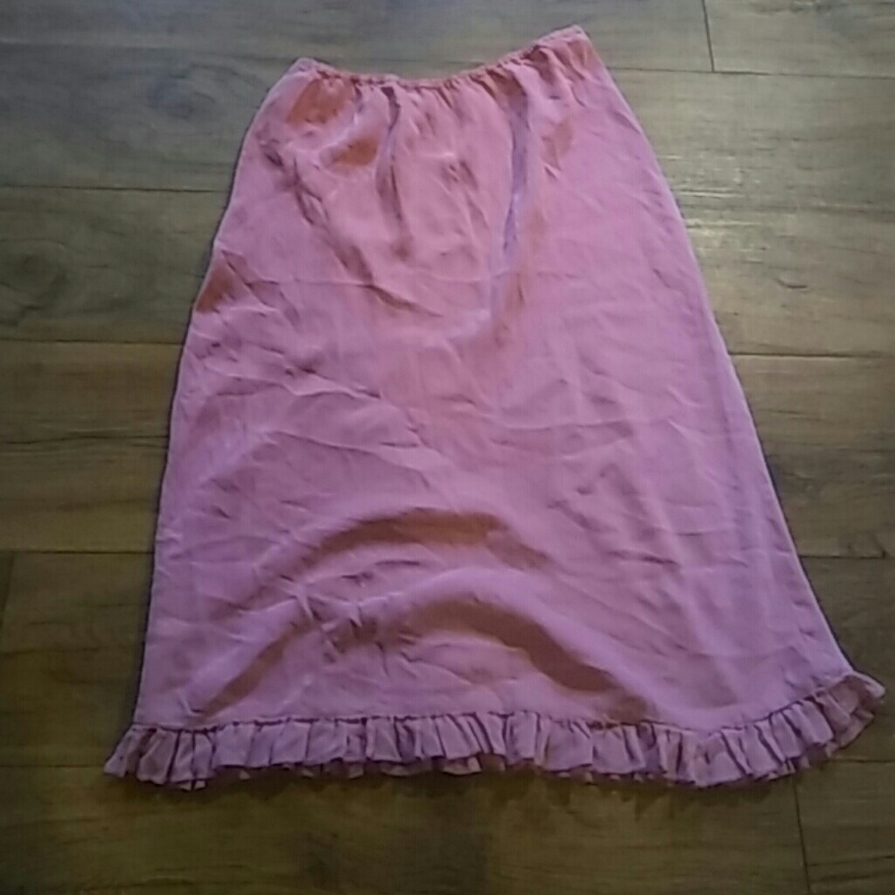 Pink slip style skirt with ruffled trim