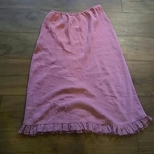 Pink slip style skirt with ruffled trim