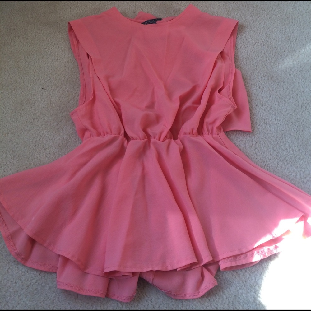 Super cute Peach Peplum Open Back top