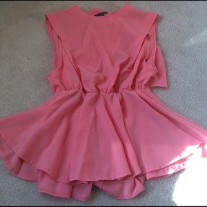 Super cute Peach Peplum Open Back top