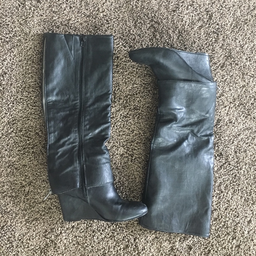 Black below the knee wedge boots