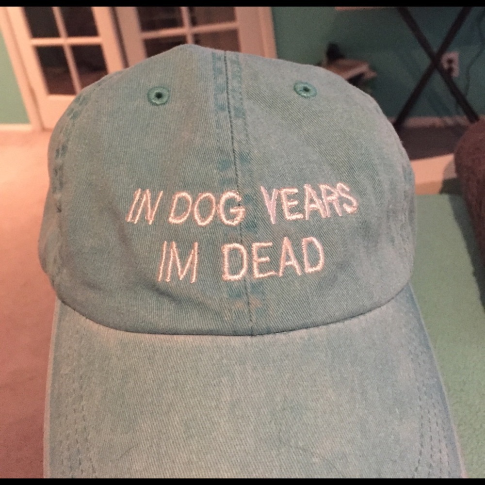 "in dog years i'm dead" turquoise casual hat