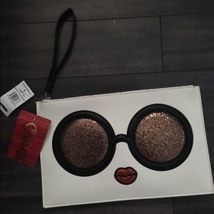 New Carlos Santana Lg clutch glasses.