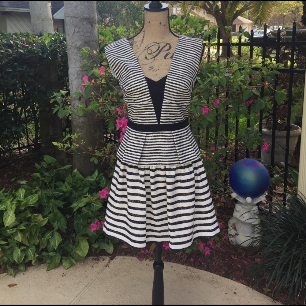 Black and Tan backless dress.  Has all hook & eyes