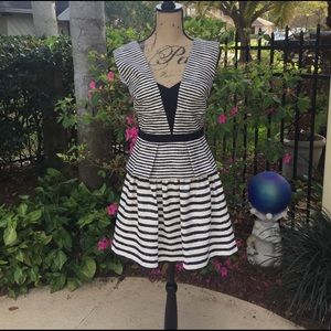 Black and Tan backless dress.  Has all hook & eyes