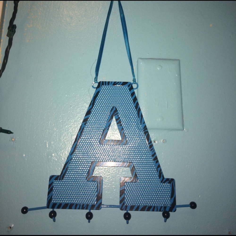 blue, hangs on the wall