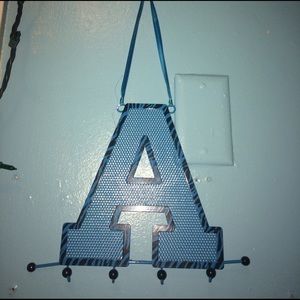 blue, hangs on the wall