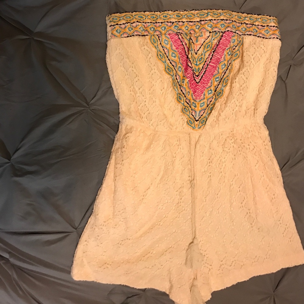 Cream romper w/ fun multi colored design