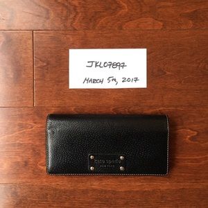 Kate Spade Black Leather Flap Front Wallet.