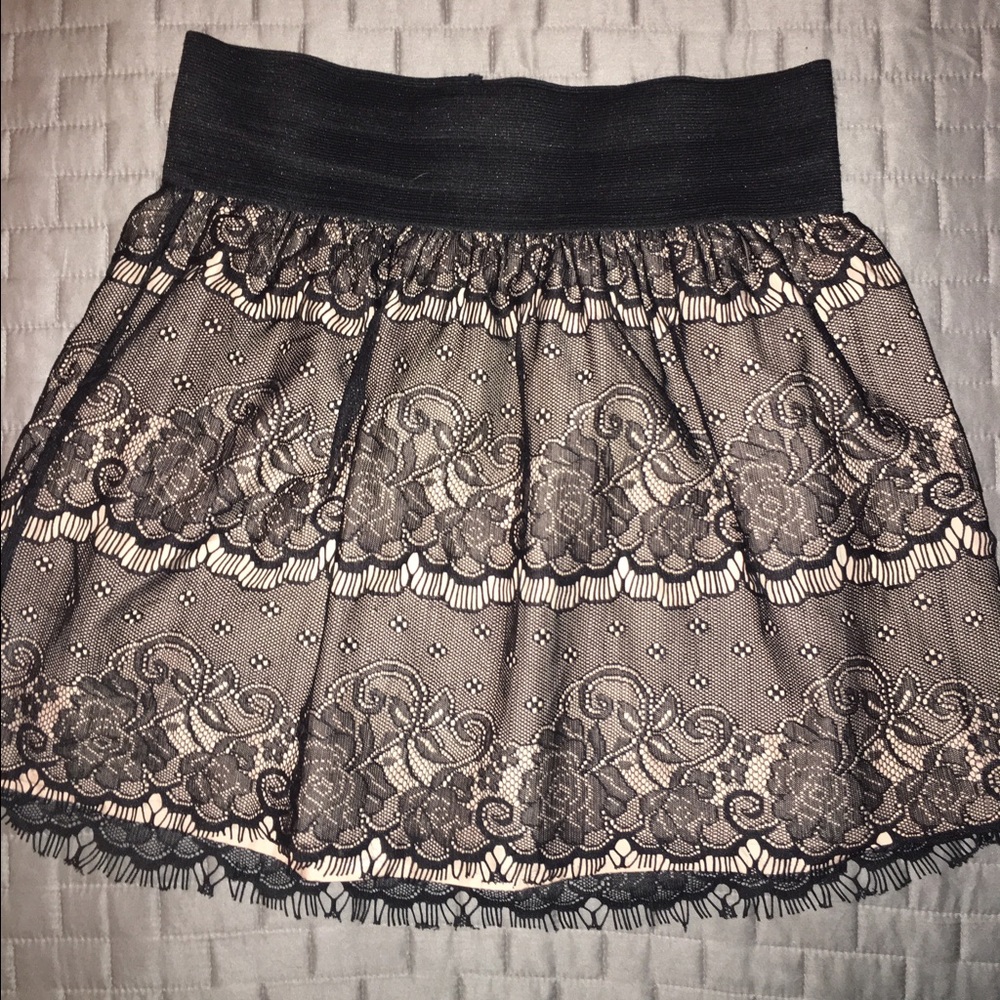 Black lace skirt w/ nude underlay