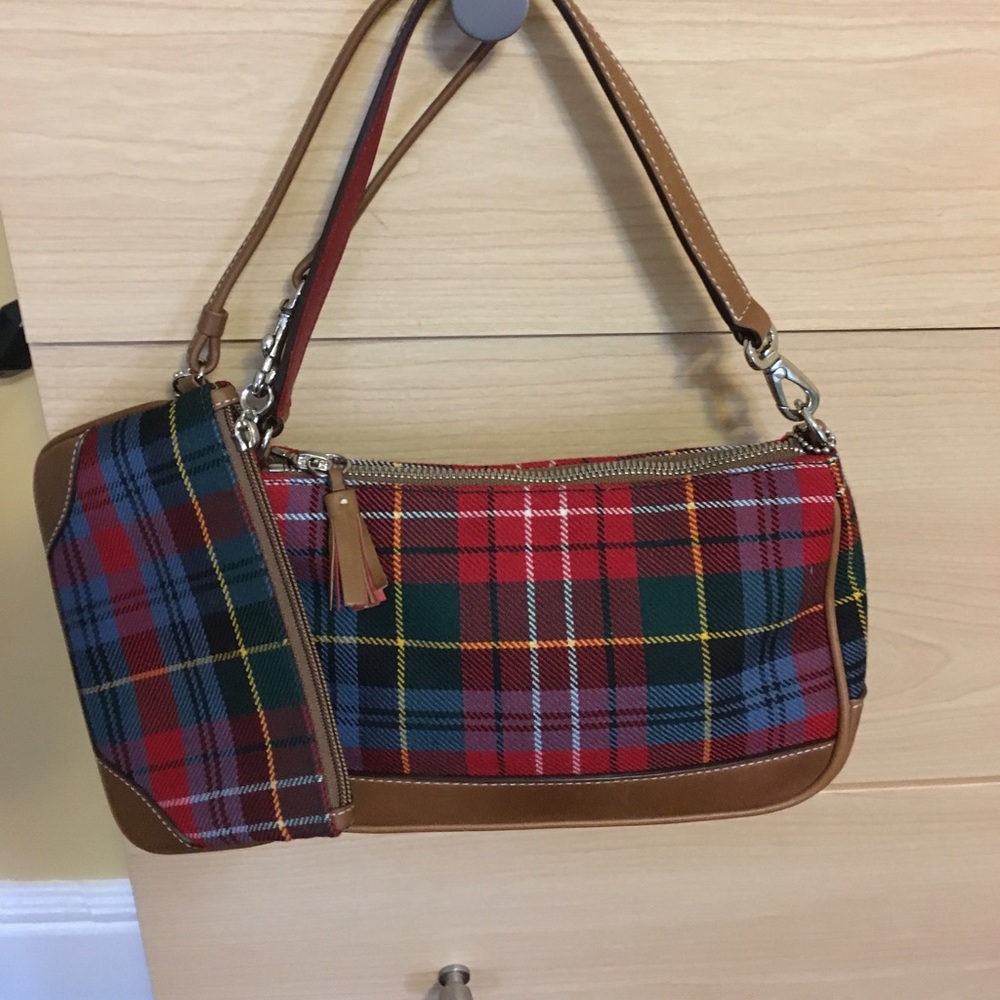 Authentic coach mini bag with wristlet.
