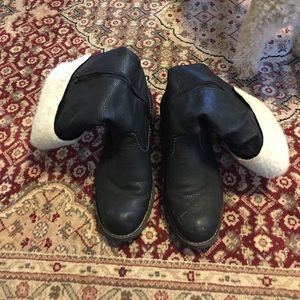 Black inside seam zip, wool lined Rieker Boots