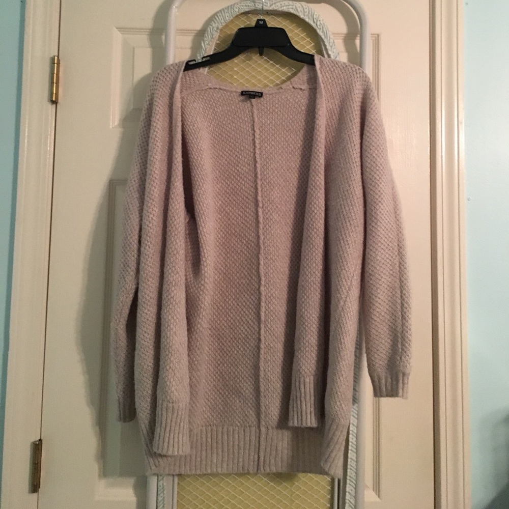 Tan brown sweater.