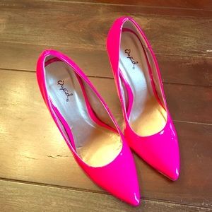 Hot pink stiletto pumps