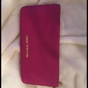 Authentic Michael Kors pink wallet