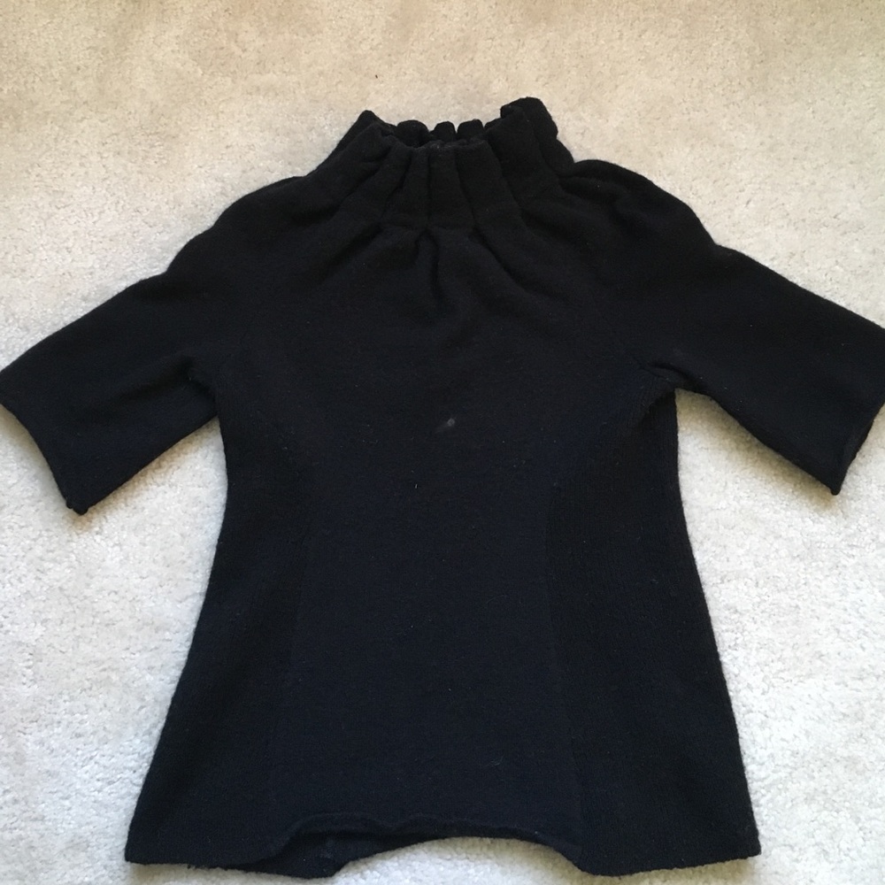 Moth ruffle neck sweater