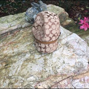 Karee coach hat ...Others are asking $90-$50...