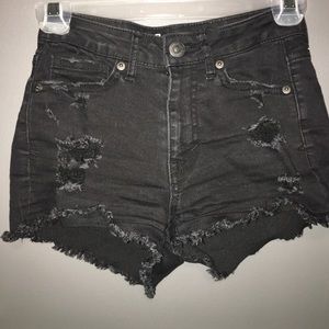 Destressed Black high waisted shorts