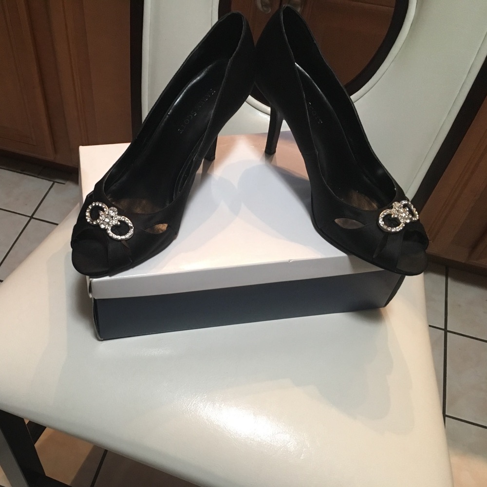 A pair of shoes with the original box