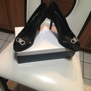 A pair of shoes with the original box