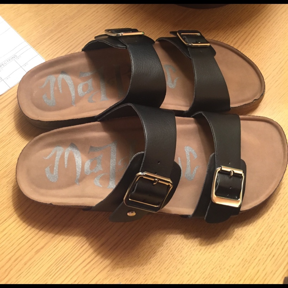 Black birkenstocks . OFFERS ACCEPTED .