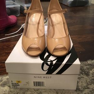 PRICE REDUCED size 8 Nine West peep toe nude pumps