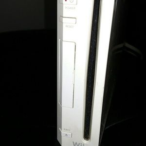Wii console with games and microphone