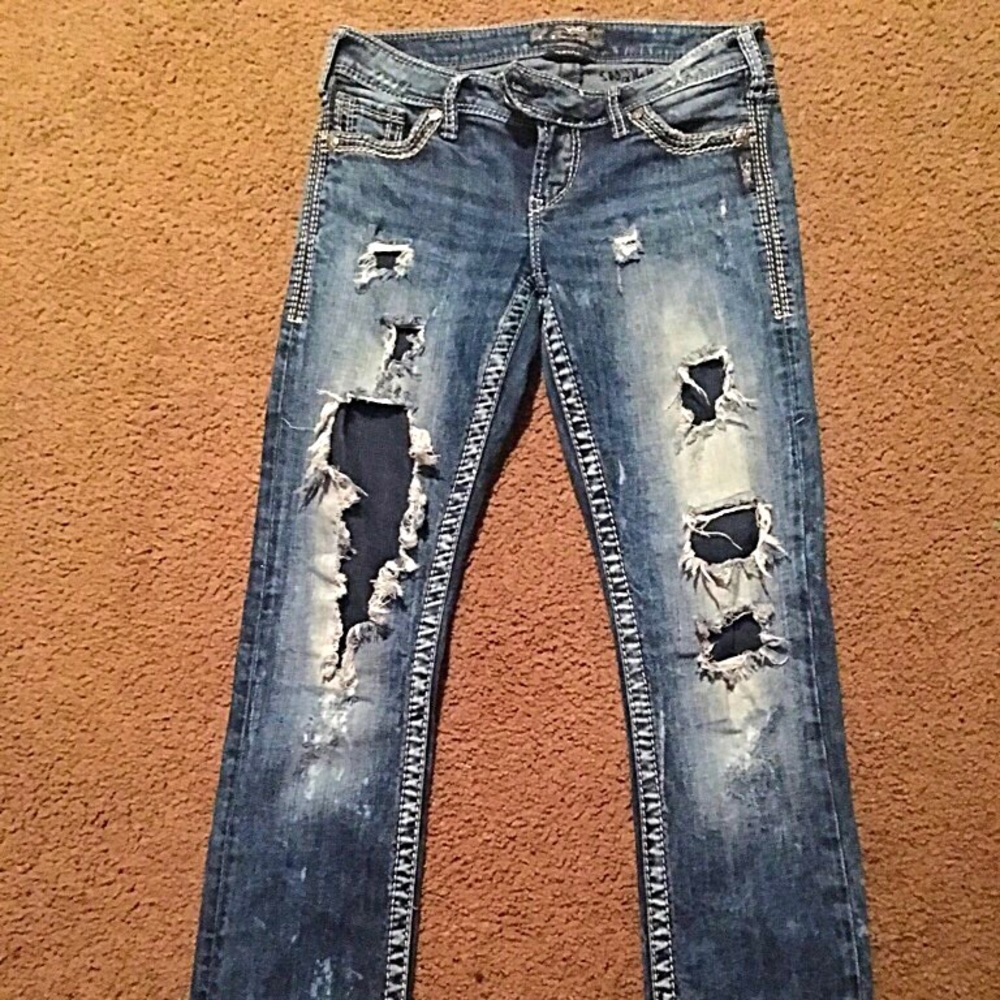 SOLD!! Never worn silver skinny jeans