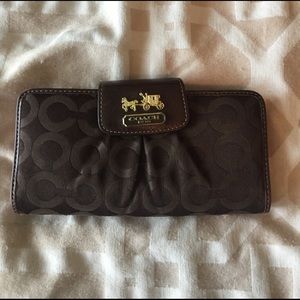 Dark brown coach wallet with check book insert
