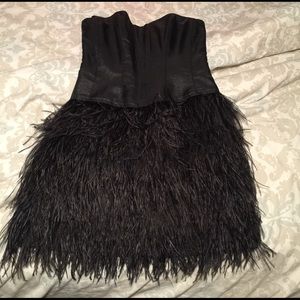 Black feather cocktail dress by Betsy Johnson.