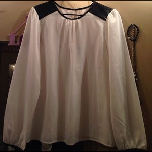 White blouse with faux leather shoulders