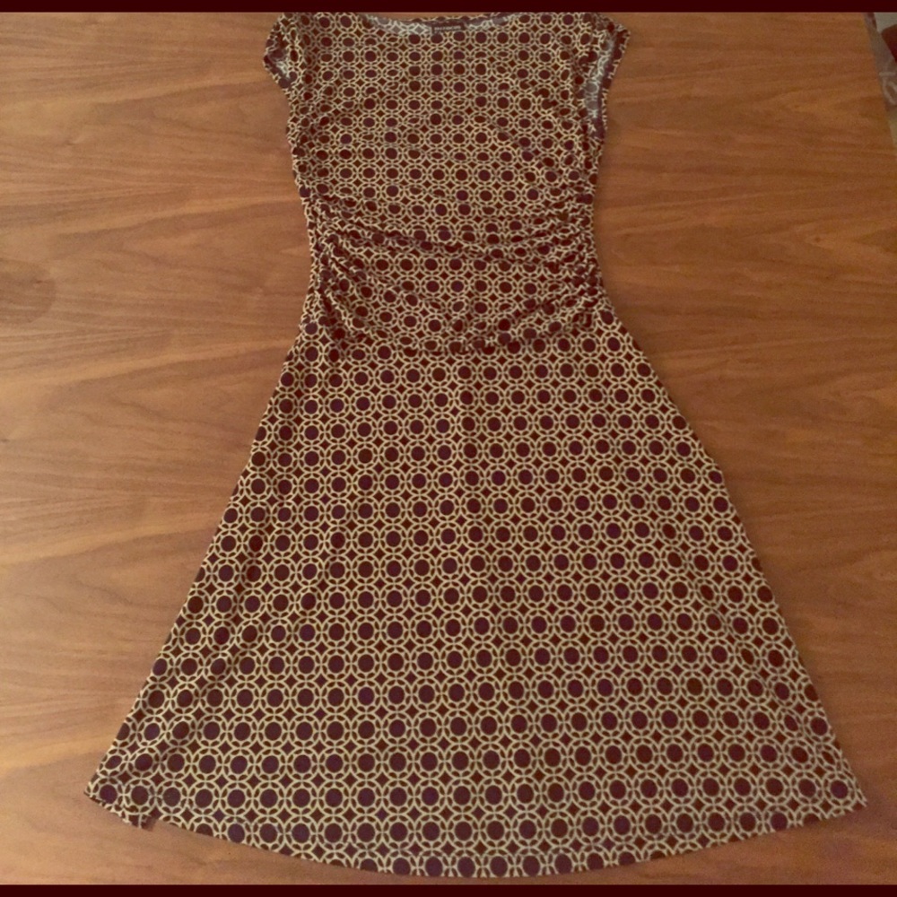 Figure flattering patterned dress.