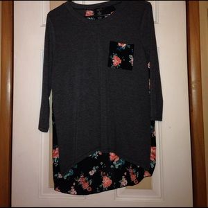 Dark gray shirt with flower design on back